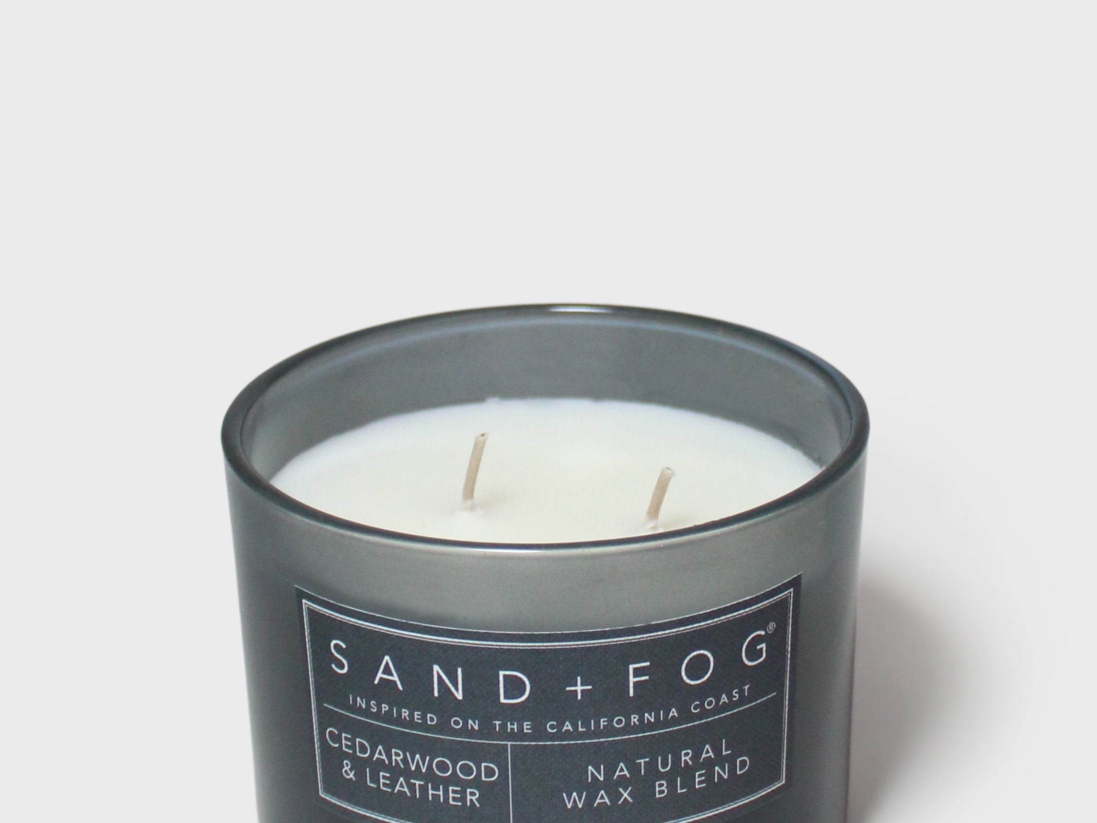 12 oz cedarwood & leather scented candle in dark glass jar with two wicks