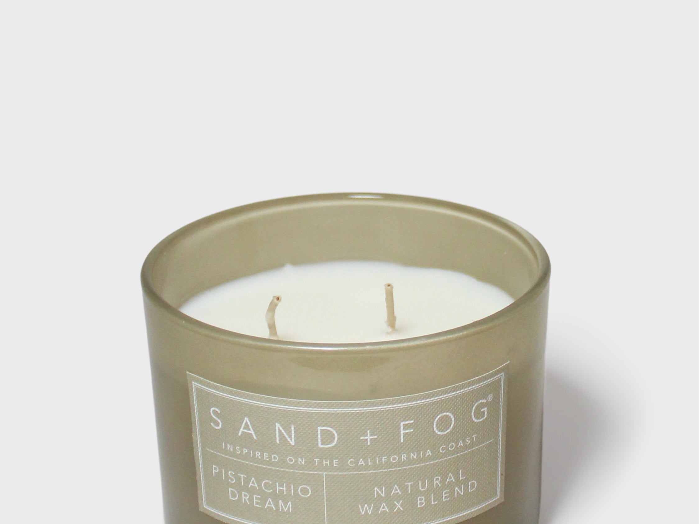 SAND+FOG 12 oz scented candle in sage jar, two wicks, Pistachio Dream label