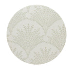 12 oz scented candle with pale patterned lid featuring fern-like leaves