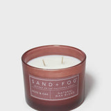 Rose & Oak 12 oz scented candle in brown glass jar with label and visible wicks
