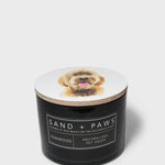 Black SAND + PAWS scented candle with dog image on lid