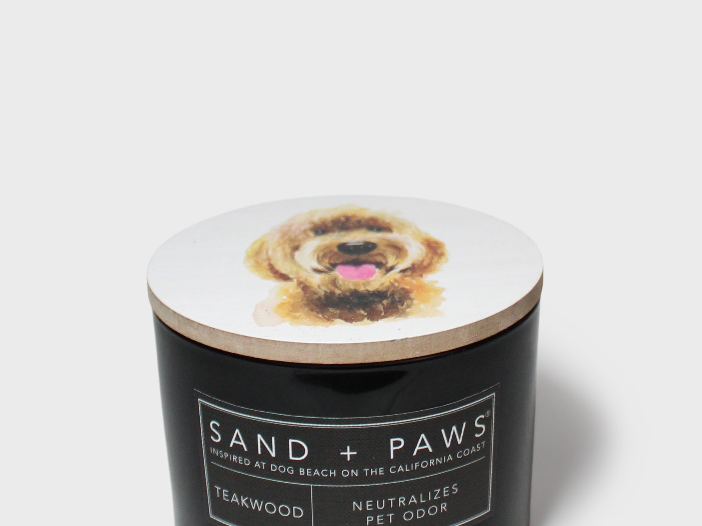 Black SAND + PAWS scented candle with dog image on lid