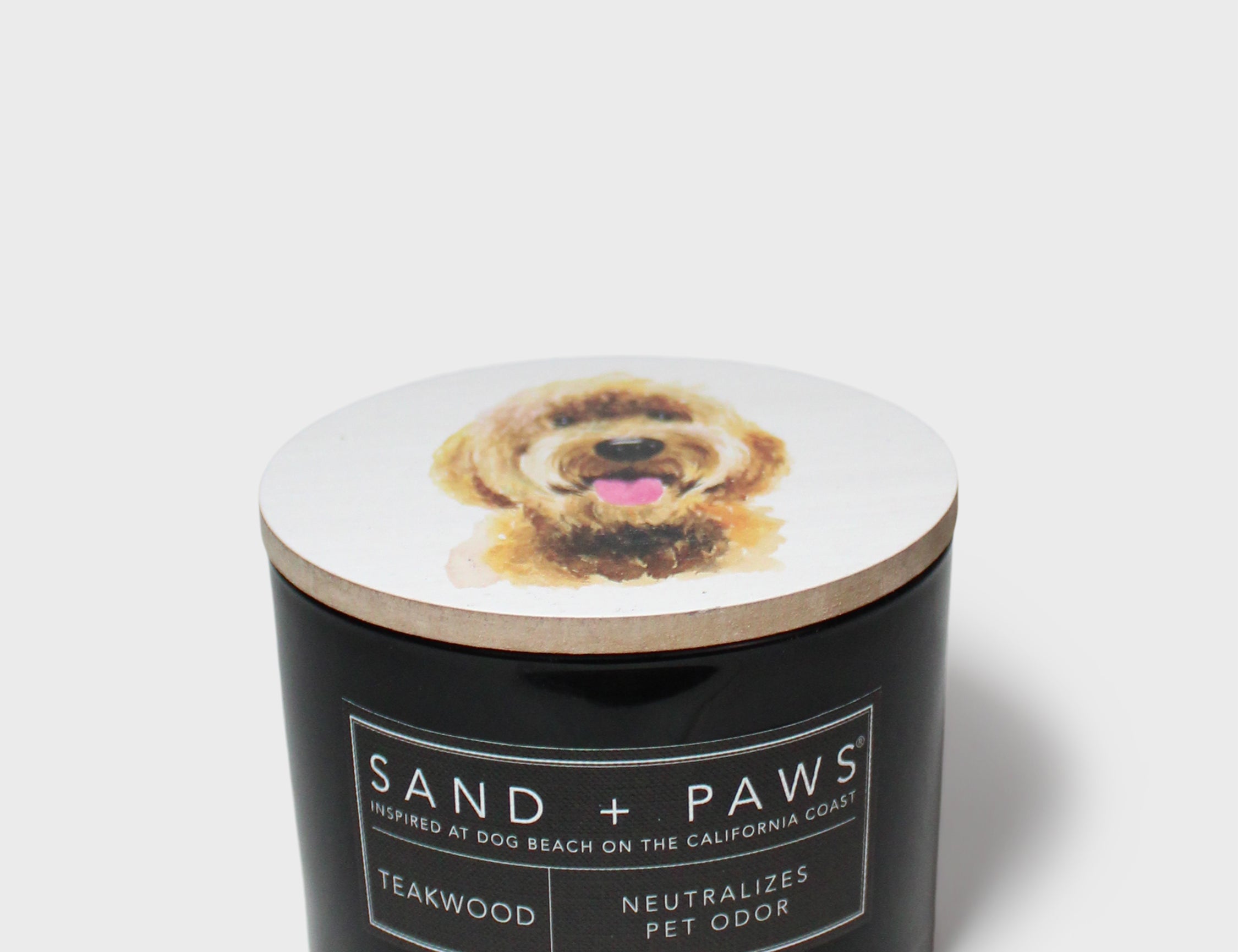 Black SAND + PAWS scented candle with dog image on lid