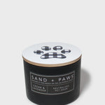 Black scented candle jar with plaid paw label and cedar lavender scent text