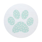 Scented candle lid cover with white paw-print pattern on light background