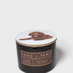 Sand + Paws Amber Nights scented candle with dog image on lid