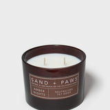 Sand + Paws Amber Nights 12 oz scented candle in dark jar, two wicks