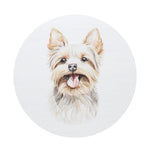 Dog face illustration on white candle lid, circular top view