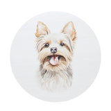 Dog face illustration on white candle lid, circular top view