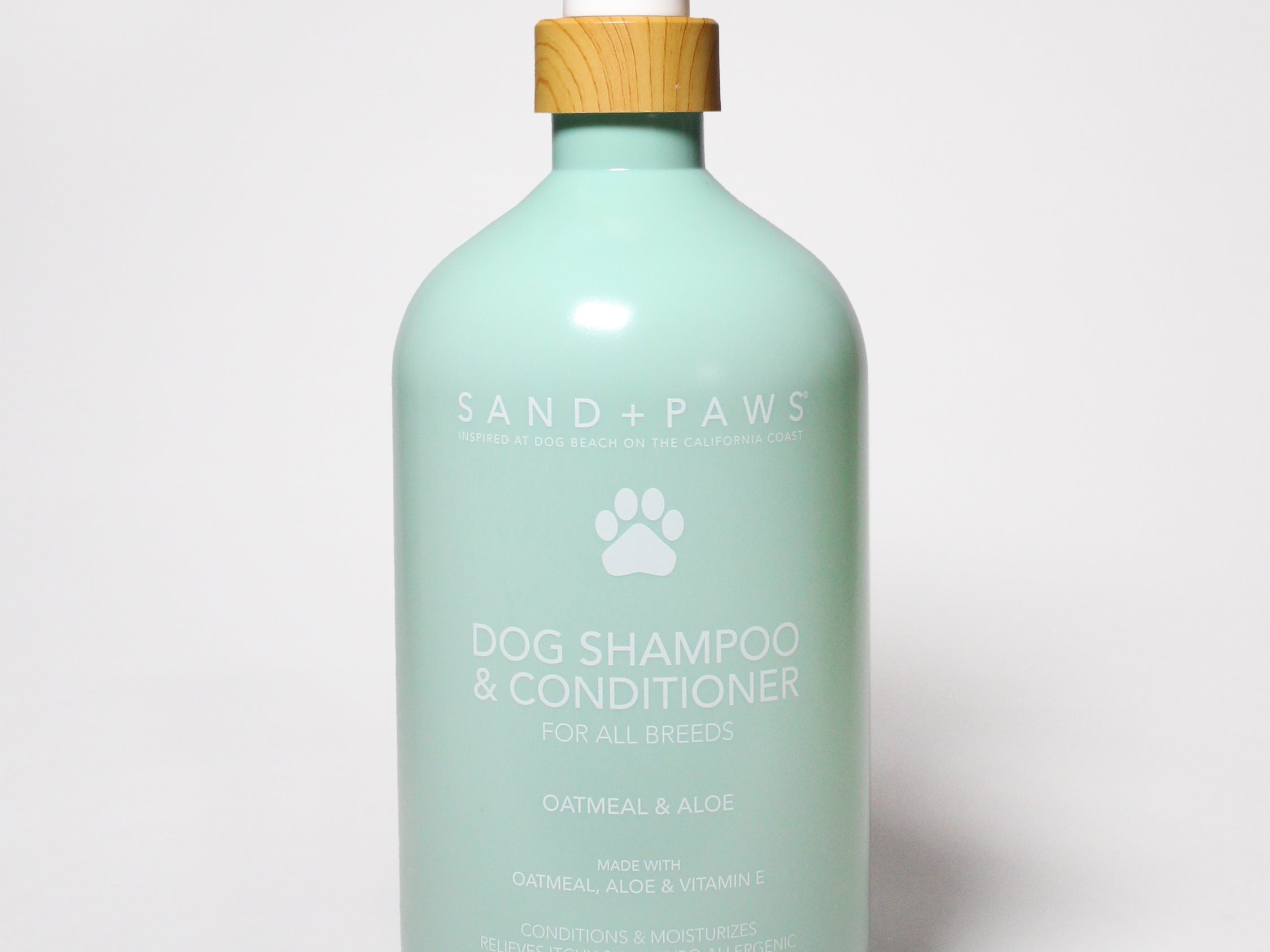 Dog shampoo and conditioner bottle with pump dispenser, pale teal, paw print label