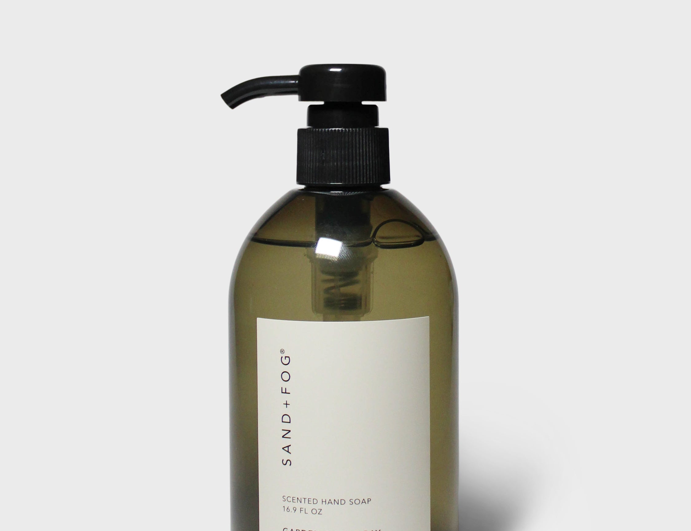 Garden by the Bay liquid hand soap in dark olive bottle with black pump dispenser