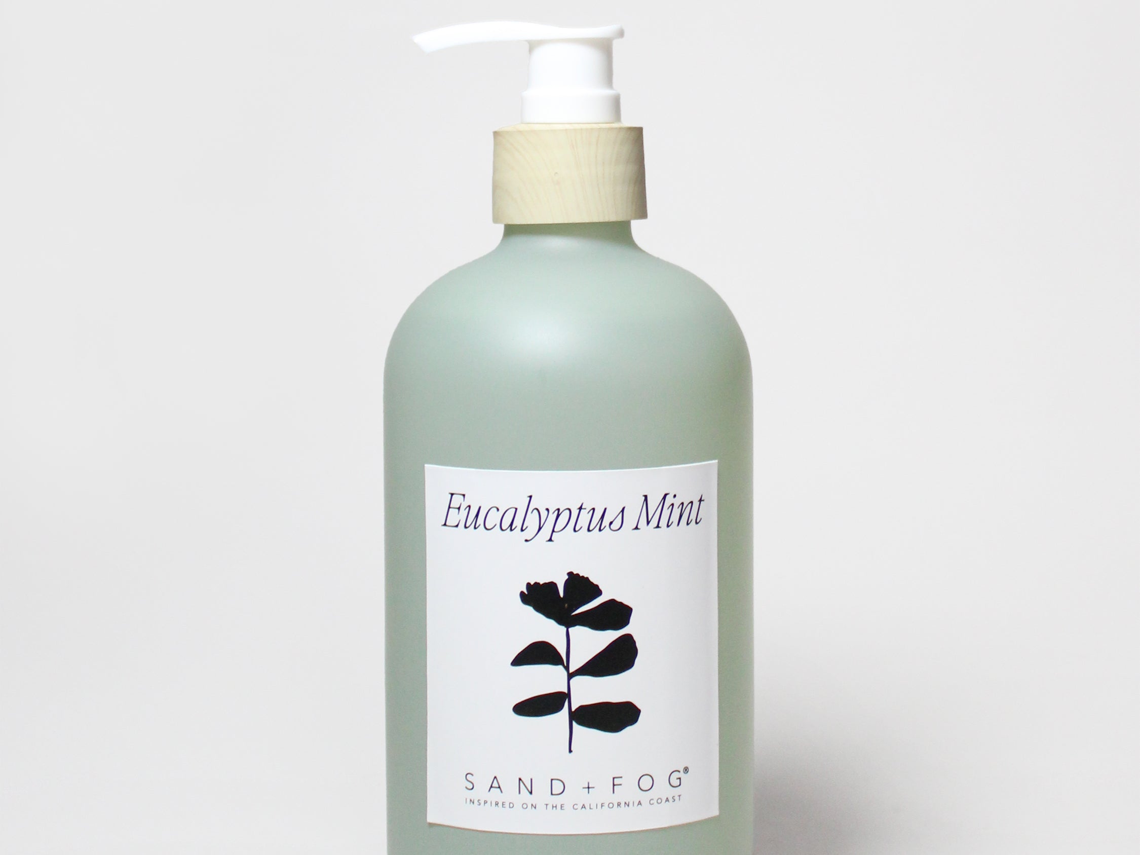 Liquid hand soap bottle with pump, Sand+Fog eucalyptus mint label.