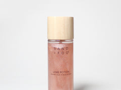 Sand + Fog shimmer hair & body perfume Love Potion, 103 ml, rose-gold spray