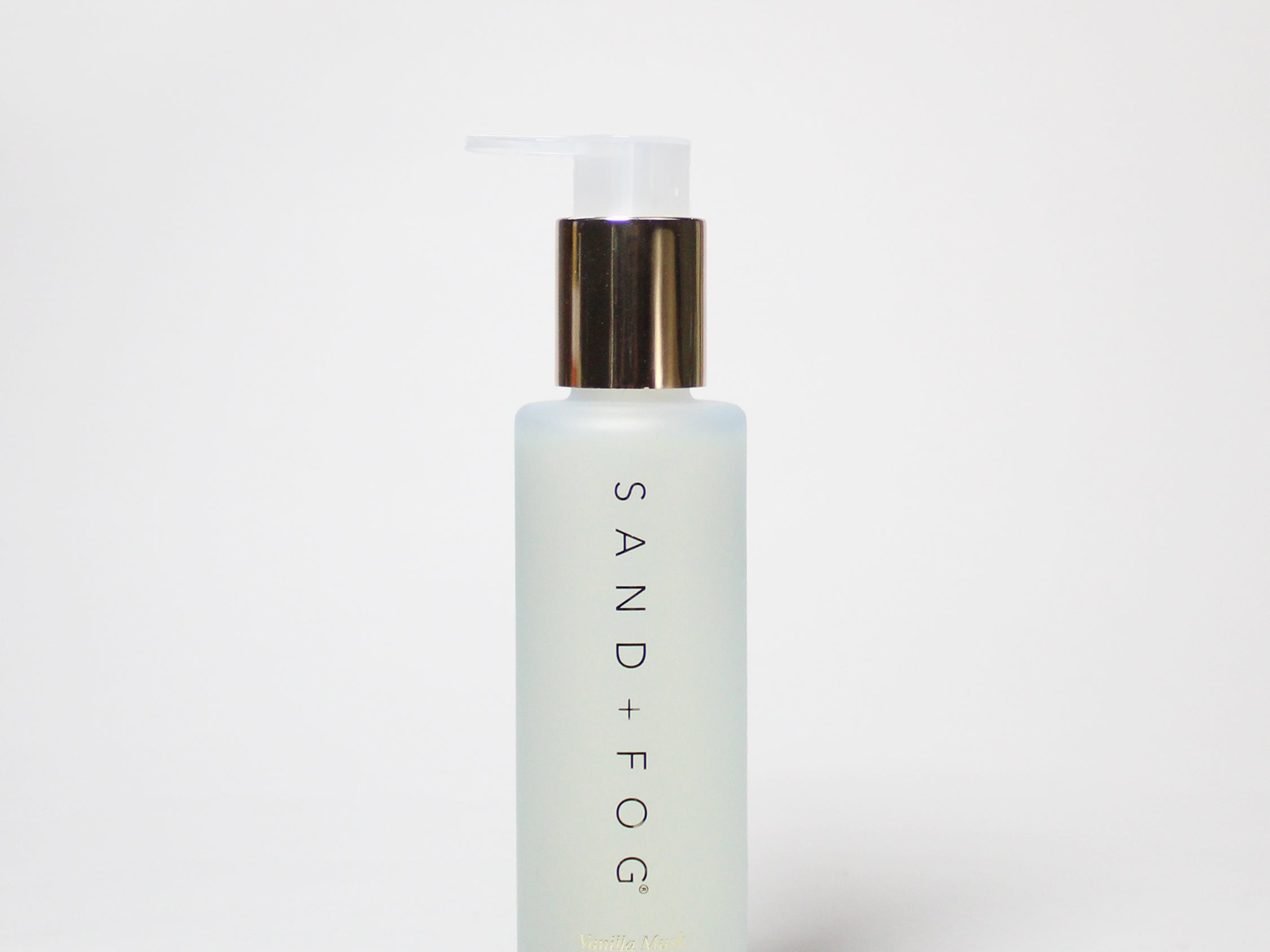 Vanilla musk body oil bottle, frosted light-blue glass with gold cap, 120 ml