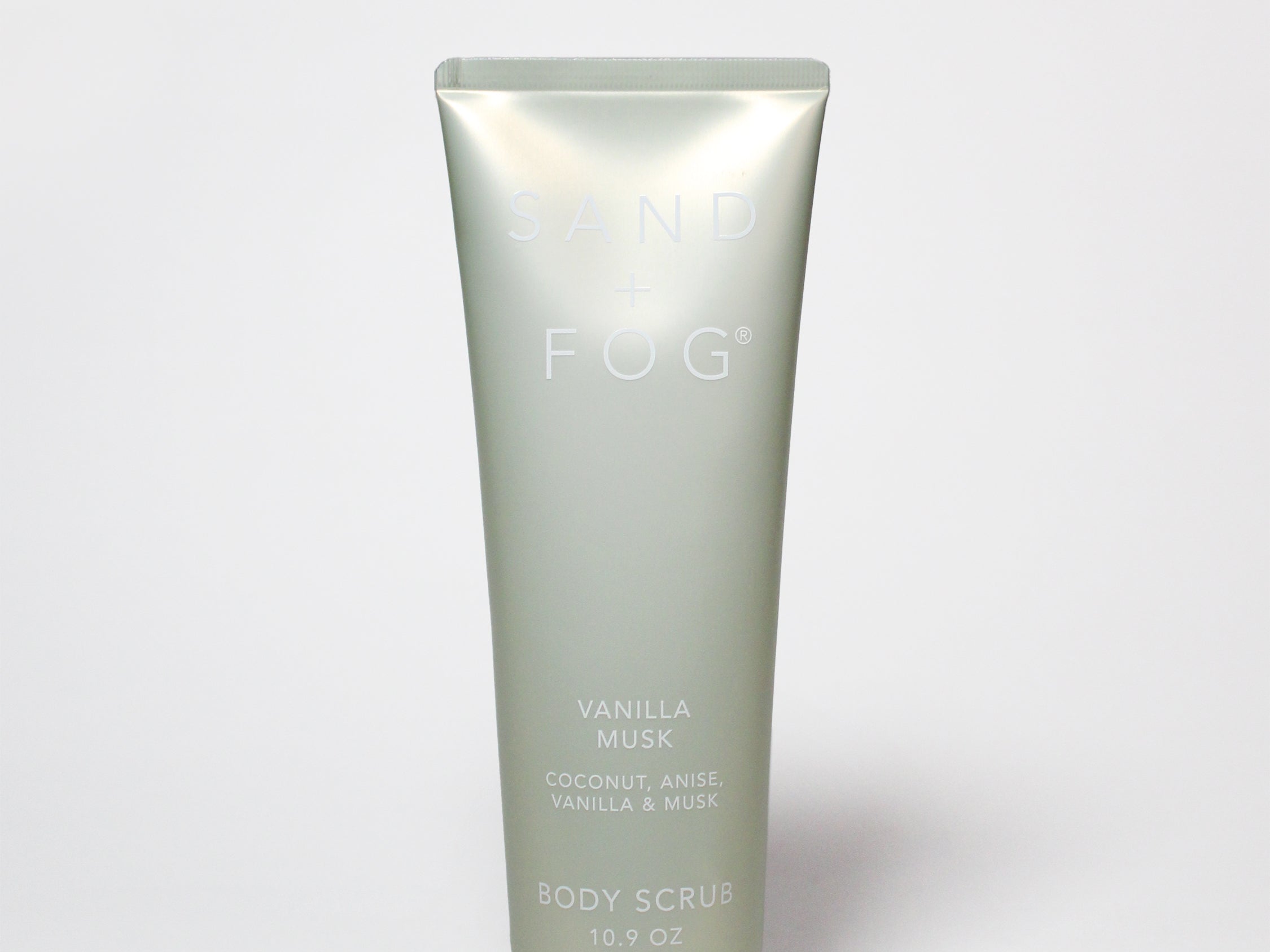 Vanilla musk body scrub in a squeeze tube, labeled Vanilla Musk, 10.9 oz