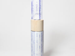 Reed diffuser bottle with wooden cap and blue patterned label