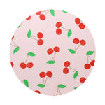 Scented candle lid with red cherry and green leaf pattern