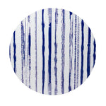 Blue-and-white patterned lid for the Clean Waves scented candle