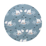 Blue candle lid top with repeating cat, fish, and wave pattern