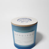 California Beach House 21 oz candle with a lid