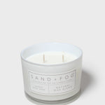 SAND+FOG scented candle in frosted jar with white wax, Natural Wax Blend label