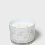 SAND+FOG scented candle in frosted jar with white wax, Natural Wax Blend label