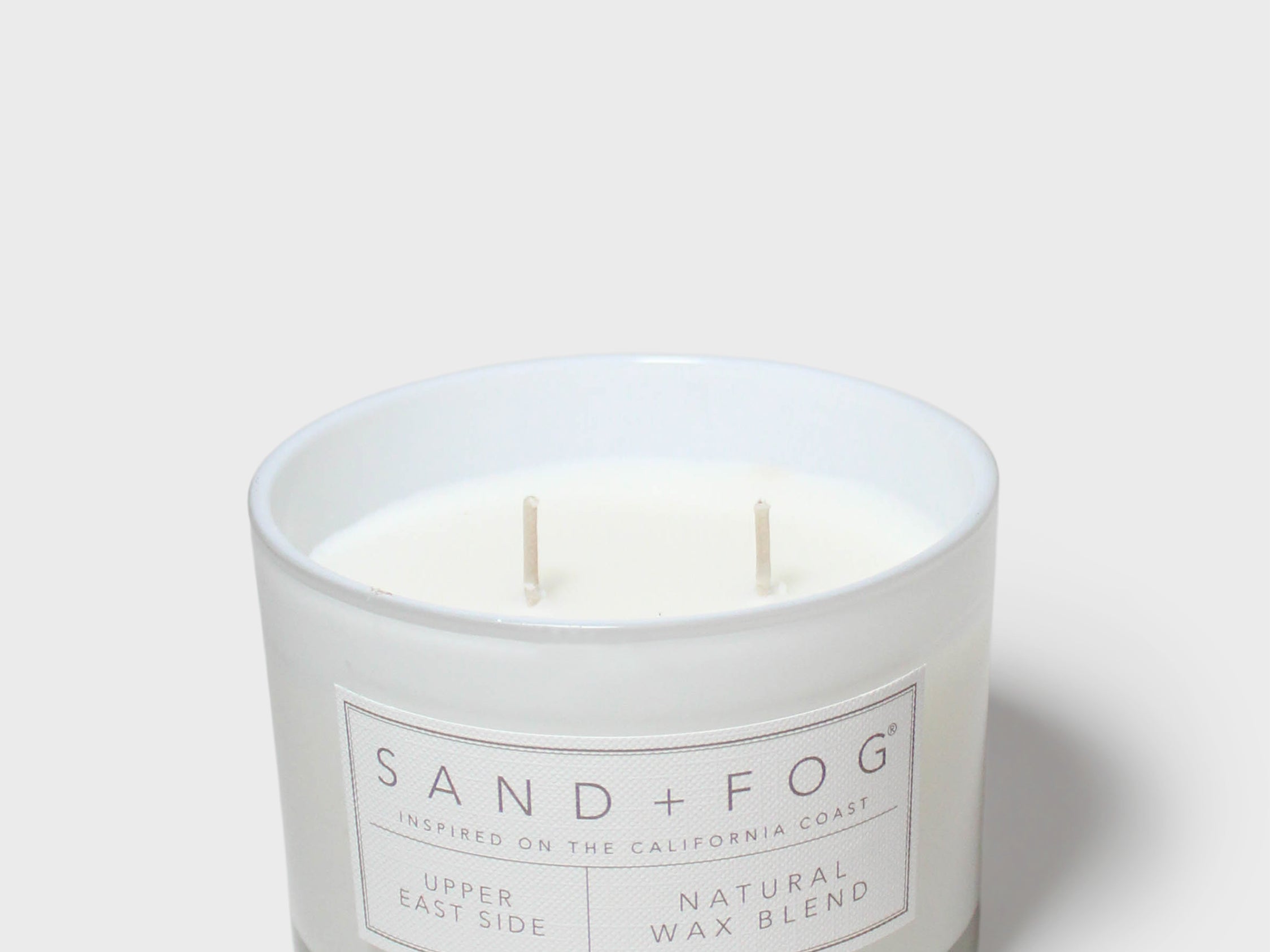 SAND+FOG scented candle in frosted jar with white wax, Natural Wax Blend label