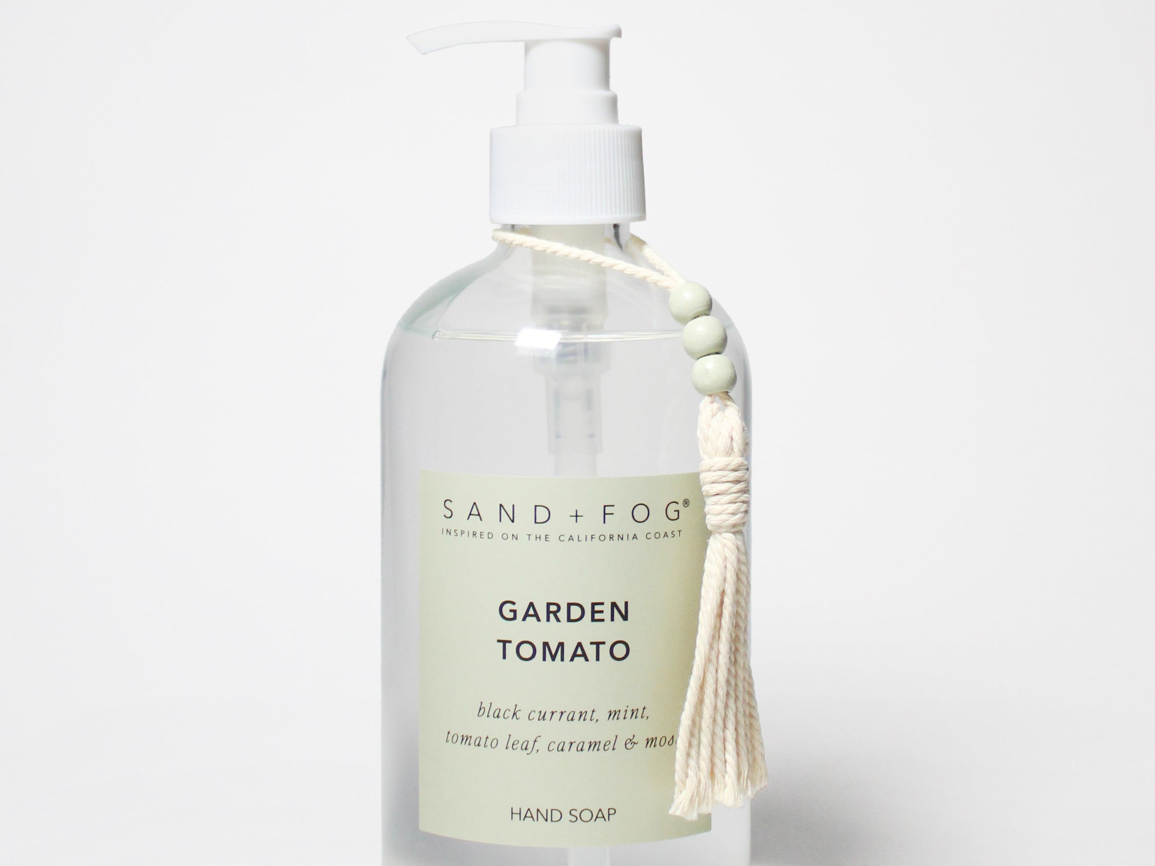 Garden tomato liquid hand soap in clear bottle with white pump and printed label