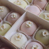 Sweet Mochi scented candle gift box with pastel mochi wax cups and floral tops